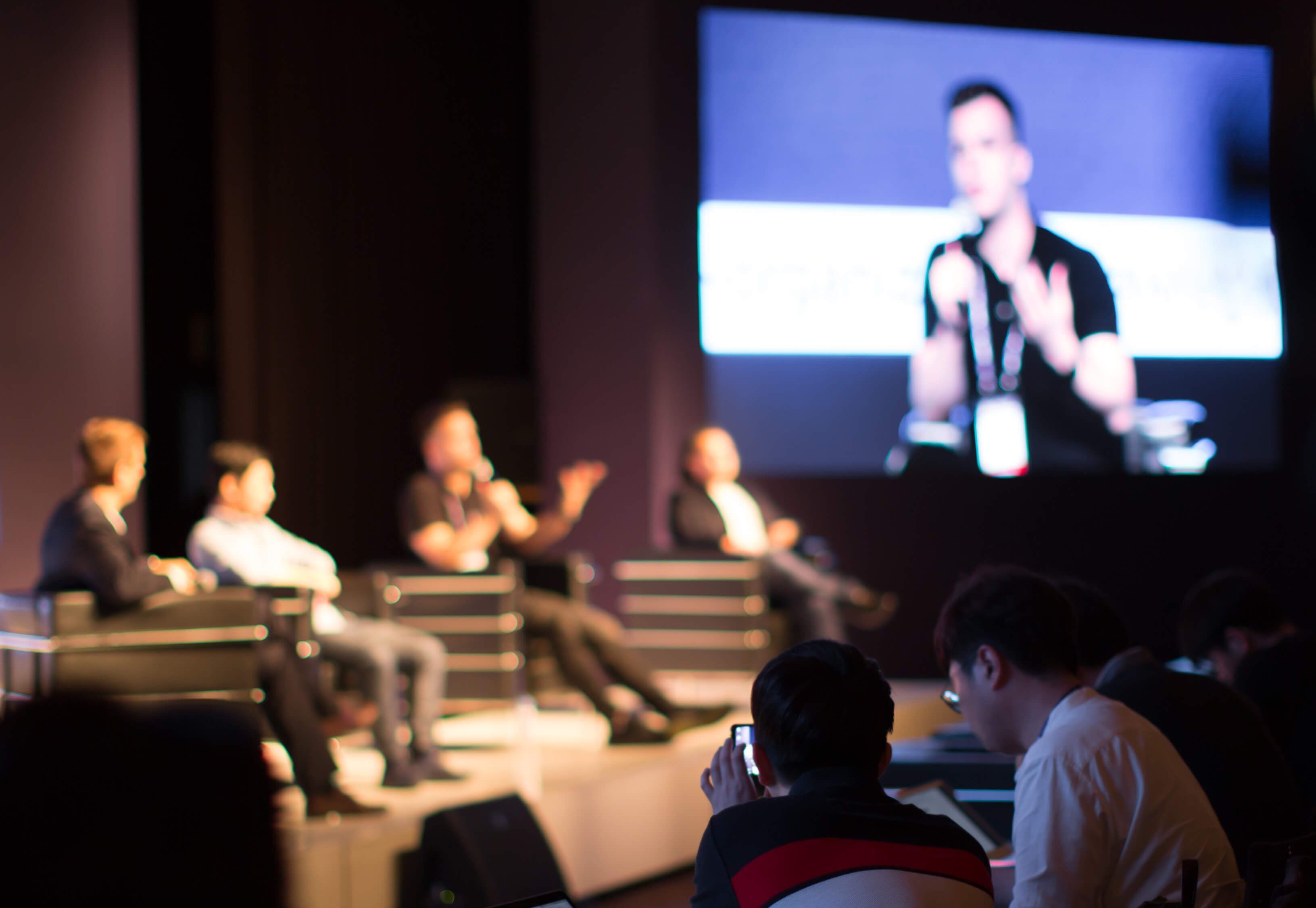 Panel on Stage during Discussion Event. Debate with Experts during Conference Seminar Presentation. Successful Executives and Entrepreneur Speakers and Presenters in Conference Hall Lecture Series.